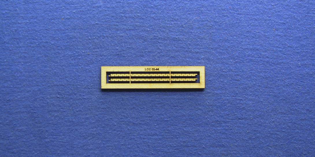 LCC 00-44 OO gauge platform end brick decoration Kit of two brick high strips designed to cover the gap between ground and pavement on the platform ends.

Length: 64mm